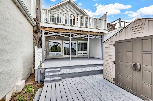 wooden deck with a storage unit