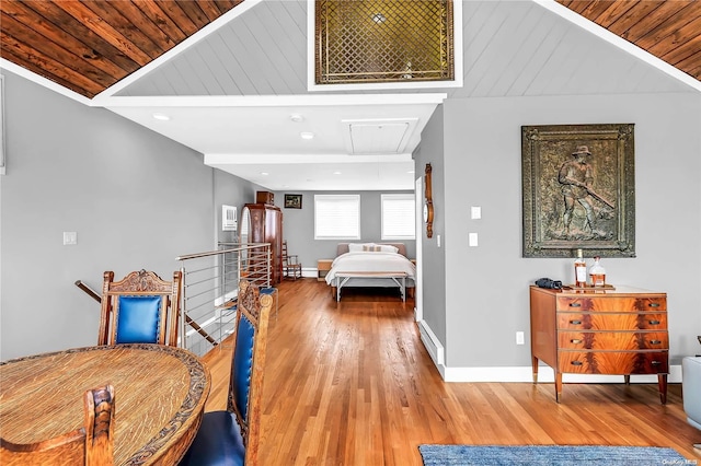 bedroom with wood-type flooring, lofted ceiling, and wooden ceiling