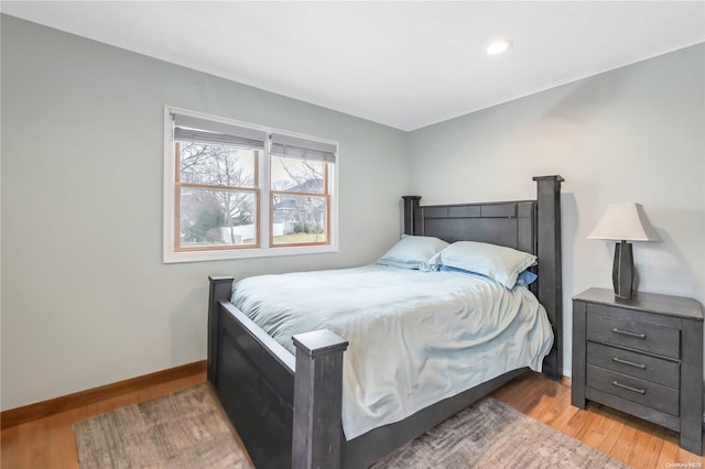 bedroom with light wood-type flooring