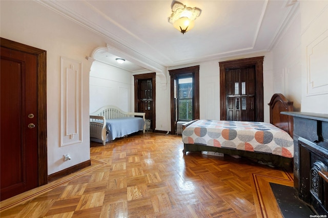 bedroom with light parquet flooring