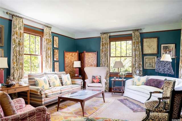 living room with a healthy amount of sunlight and carpet flooring