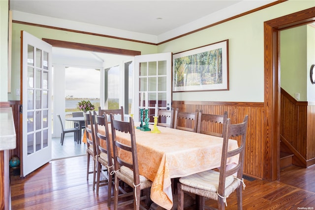 dining space featuring dark hardwood / wood-style floors