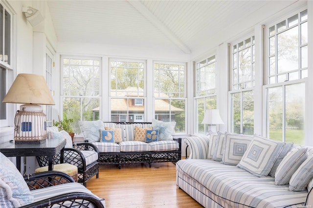 sunroom / solarium with lofted ceiling