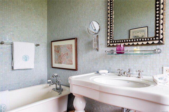 bathroom with a bathtub and sink