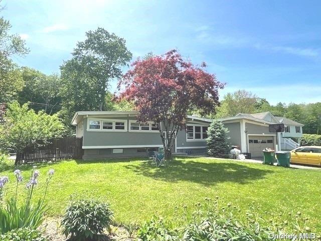 view of front of house with a front yard