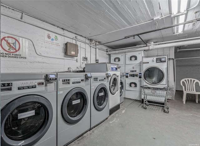 laundry area with independent washer and dryer and stacked washing maching and dryer