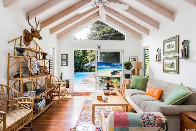 living room featuring hardwood / wood-style flooring, ceiling fan, beamed ceiling, and high vaulted ceiling