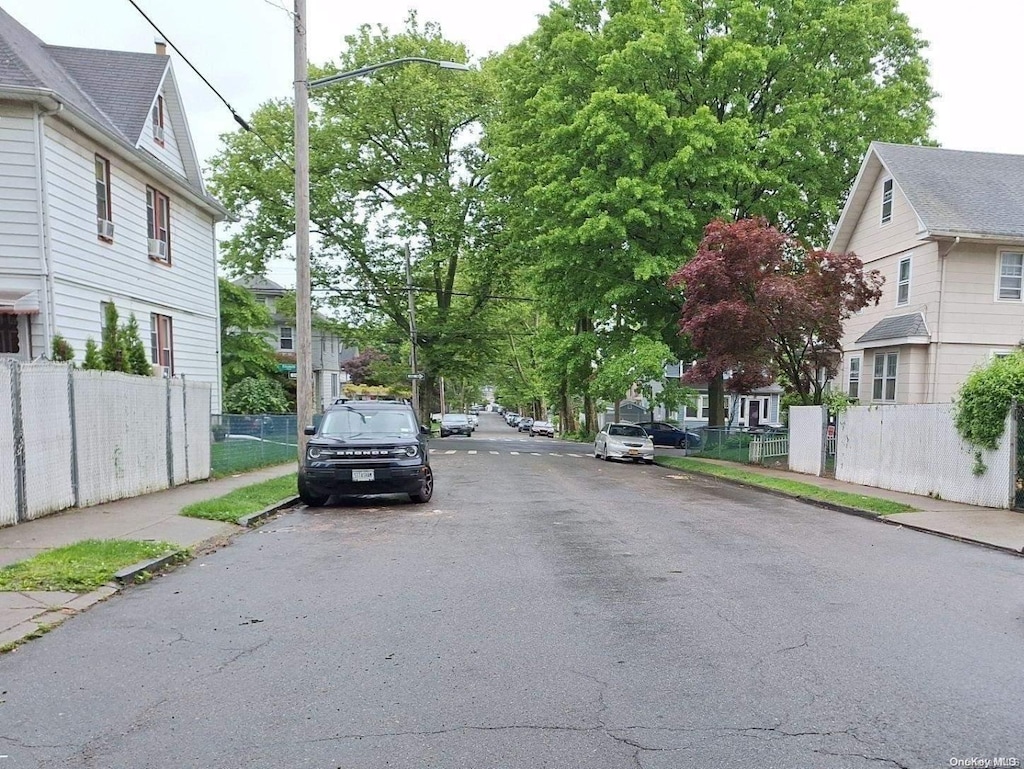 208 Myrtle Ave, Staten Island, NY 10310 - view of asphalt road featuring sidewalks, curbs, and street lighting