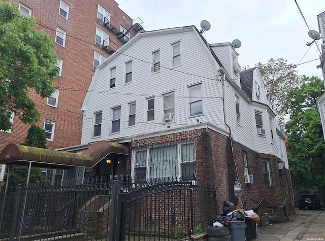 view of front facade featuring cooling unit