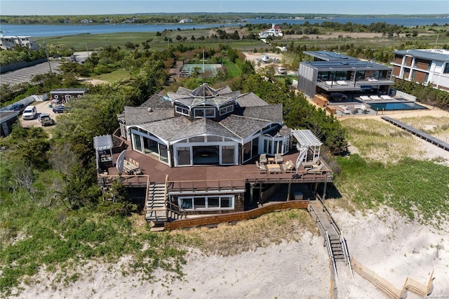 aerial view featuring a water view