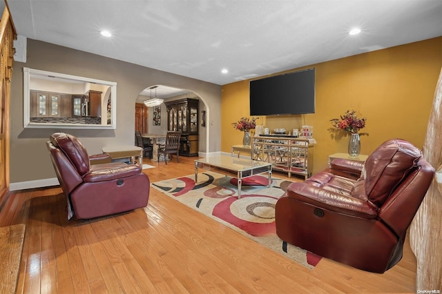 living room with light hardwood / wood-style floors