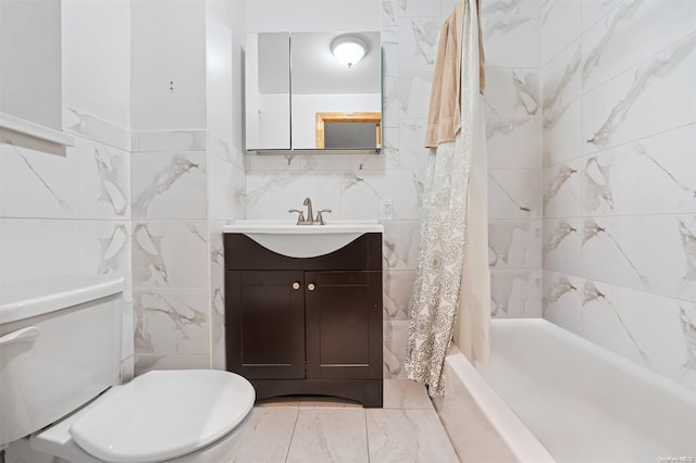 full bathroom featuring vanity, toilet, tile walls, and shower / bath combo with shower curtain