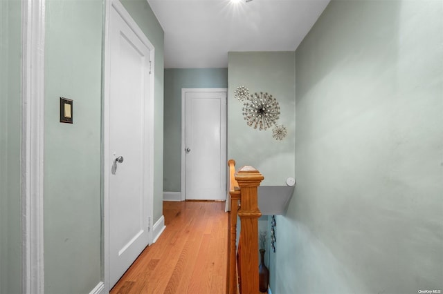 corridor featuring light hardwood / wood-style flooring