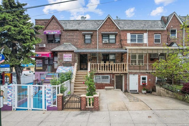 multi unit property featuring a wall mounted AC