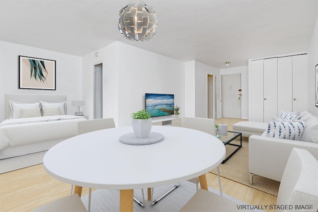 dining space featuring light hardwood / wood-style flooring