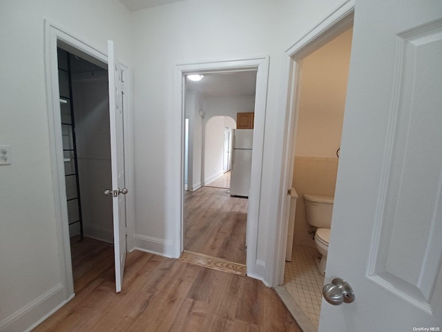 hall featuring light hardwood / wood-style flooring