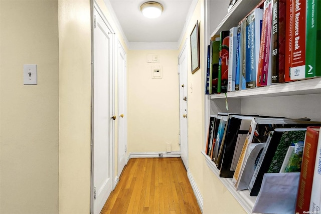 corridor featuring light hardwood / wood-style floors