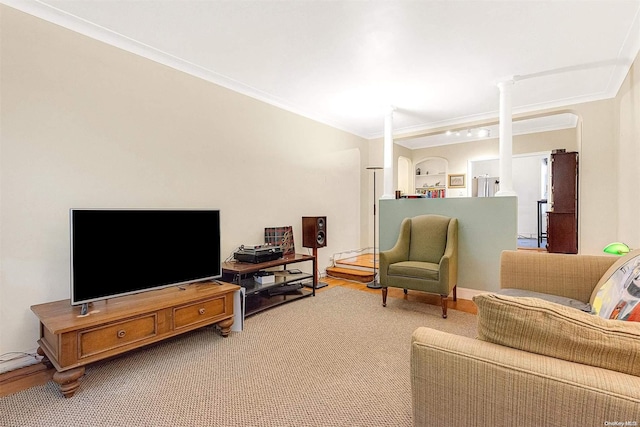 carpeted living room with ornamental molding