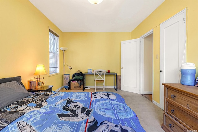 bedroom featuring light colored carpet