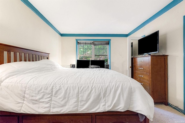 carpeted bedroom with crown molding