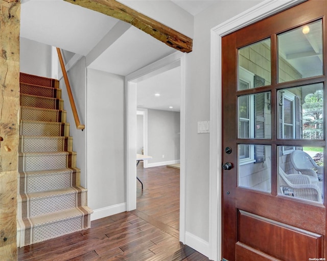 entrance foyer featuring dark wood-type flooring