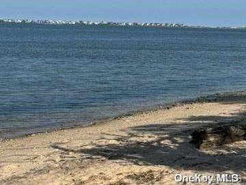 property view of water with a beach view