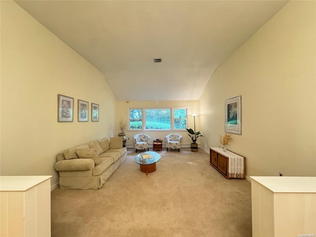 living room with light carpet and lofted ceiling