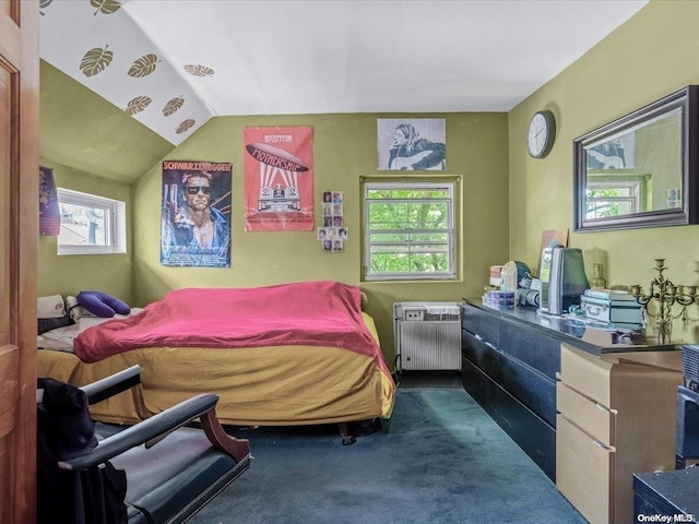 bedroom featuring radiator heating unit, dark carpet, and lofted ceiling