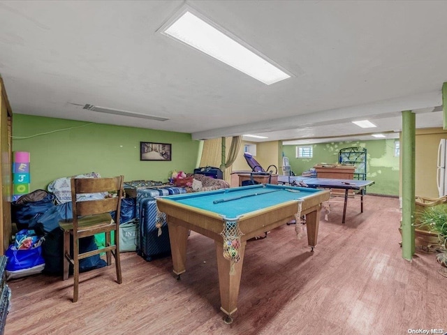 game room featuring wood-type flooring and pool table