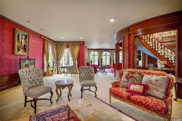 carpeted living room featuring crown molding