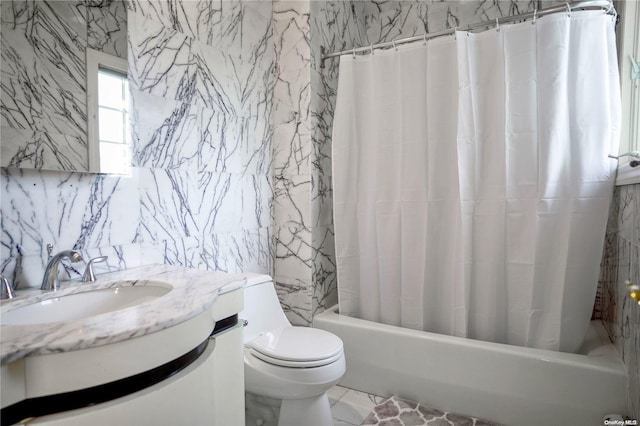 full bathroom featuring vanity, toilet, and shower / bath combo with shower curtain