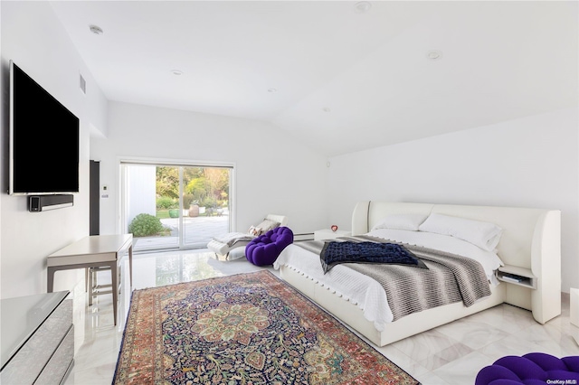 bedroom featuring access to exterior and vaulted ceiling