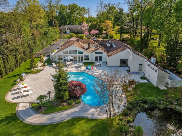 view of pool with a patio area