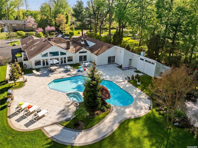 view of pool featuring a patio area