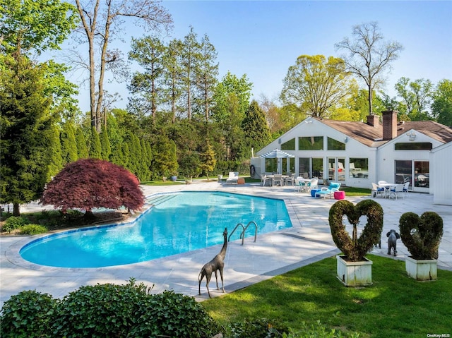 view of pool with a patio