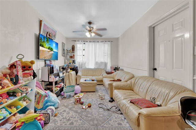 living room with ceiling fan