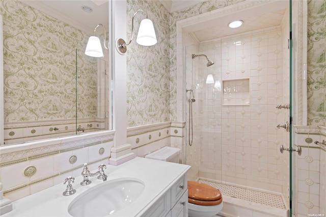 bathroom featuring walk in shower, vanity, ornamental molding, and toilet