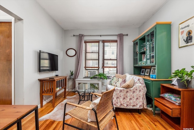 sitting room featuring light hardwood / wood-style floors