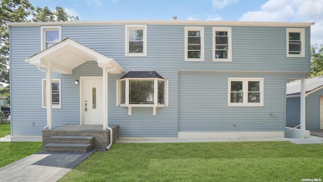 view of front of property with a front yard