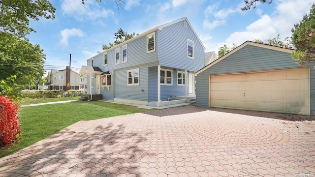 view of front of house featuring central AC unit and a front lawn