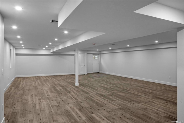 basement featuring wood-type flooring