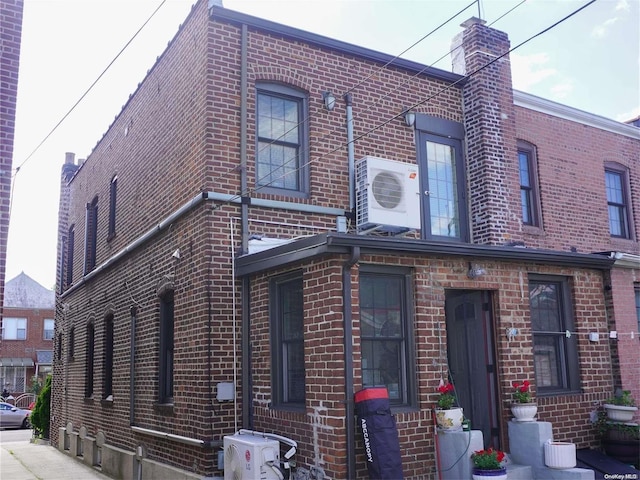 exterior space featuring ac unit