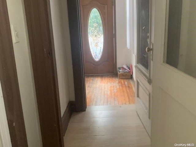 doorway with light hardwood / wood-style floors