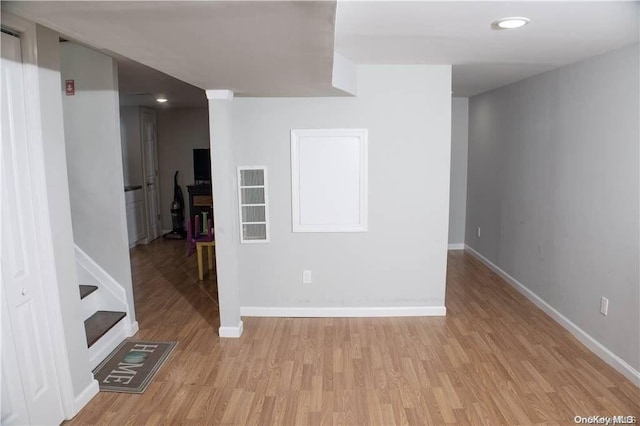 spare room with light wood-type flooring