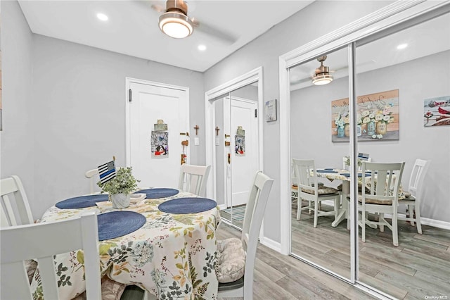 dining space with light wood-type flooring