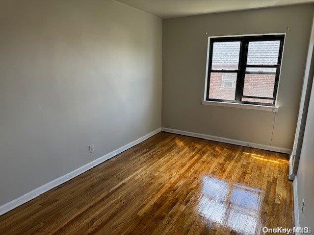 unfurnished room featuring light wood-type flooring