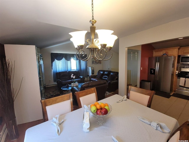 dining area with a baseboard radiator and a chandelier