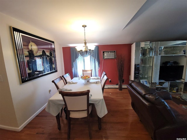 dining room featuring an AC wall unit, an inviting chandelier, baseboard heating, and dark wood-type flooring