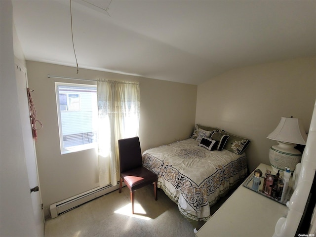 bedroom with carpet and baseboard heating