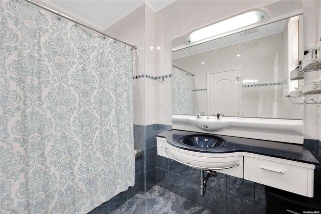 bathroom featuring vanity and crown molding